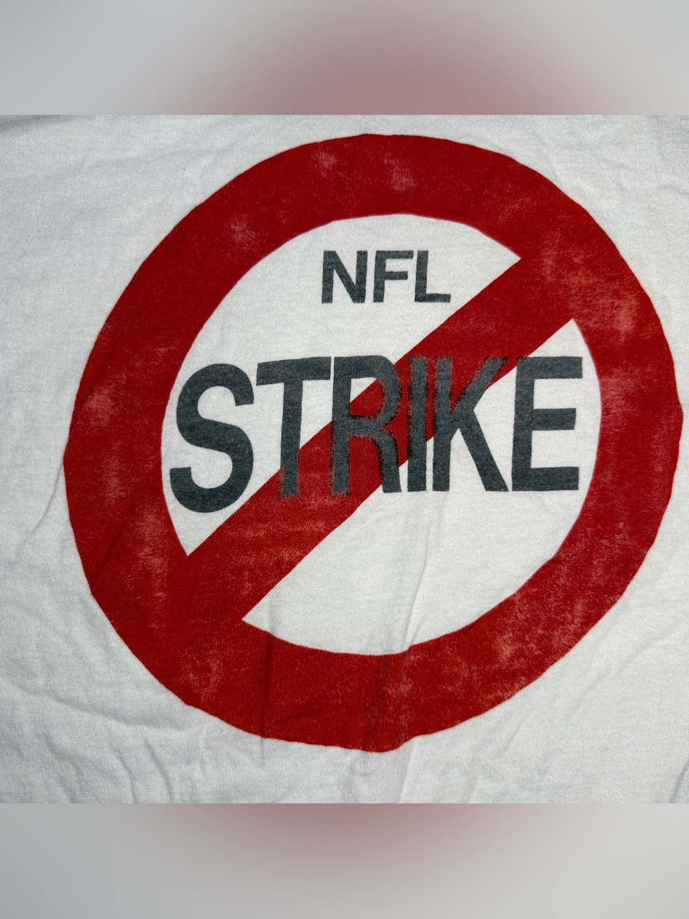 Fruit of the Loom White Tee with Red and Black NFL Strike Graphic